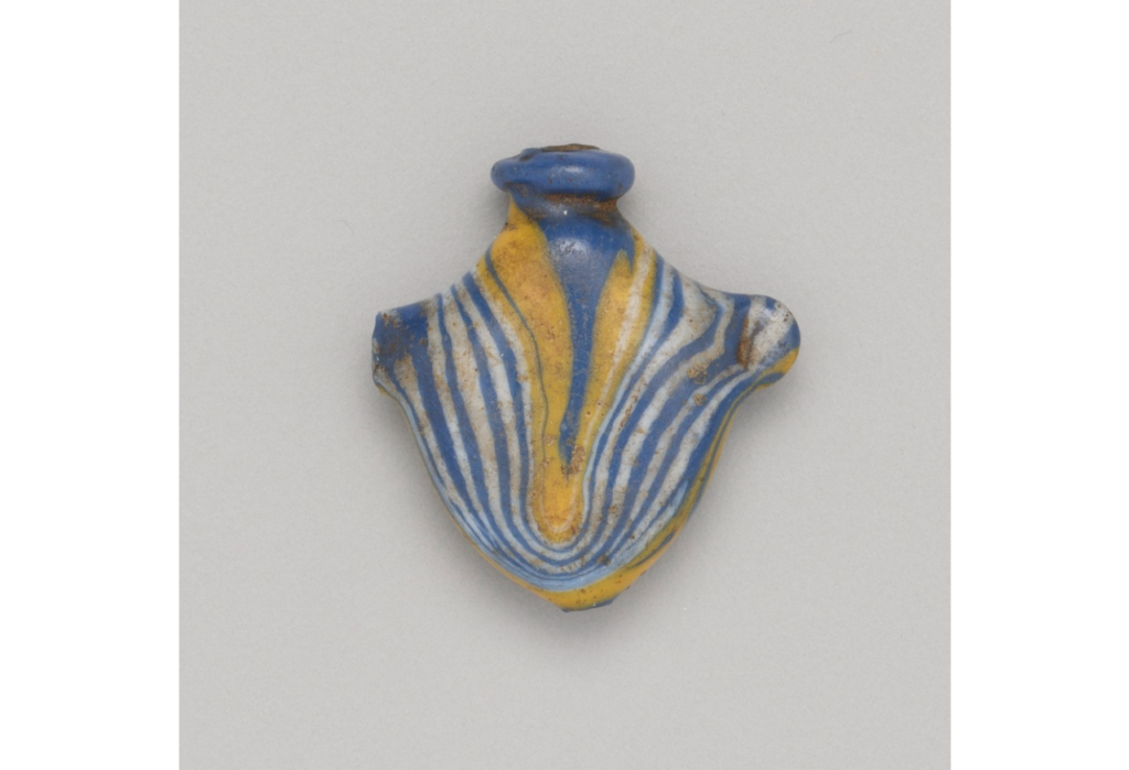 Ancient Egyptian Heart-shaped glass amulet. 